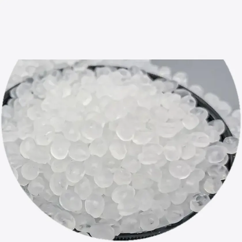 Clear virgin polymer resin pellets in a dish — Mega Win polymer business